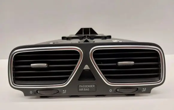 Dash center air vent grill