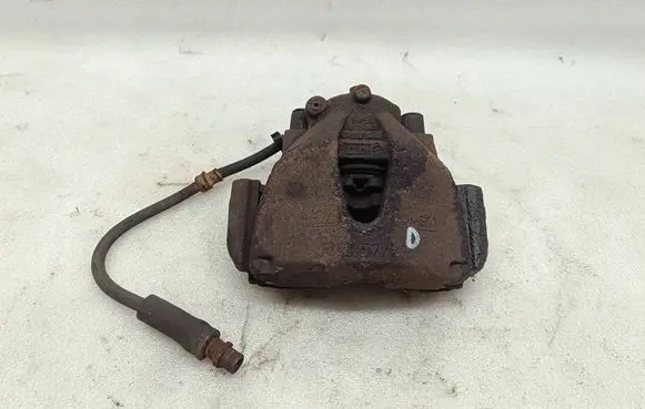 Opel Astra H Front brake caliper