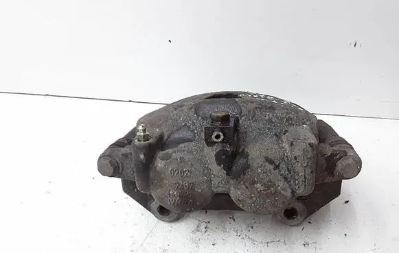 Jeep Grand Cherokee (WK) Front brake caliper 4751