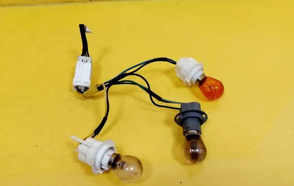 Hyundai Coupe Tail light bulb cover holder