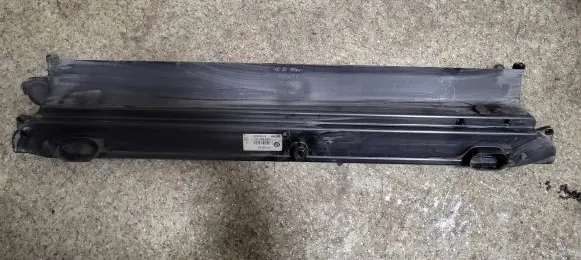 Radiator support slam panel bracket