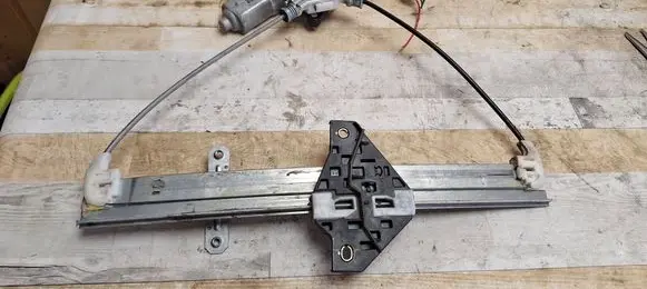 Suzuki Liana Rear door window regulator with motor 8343076F10