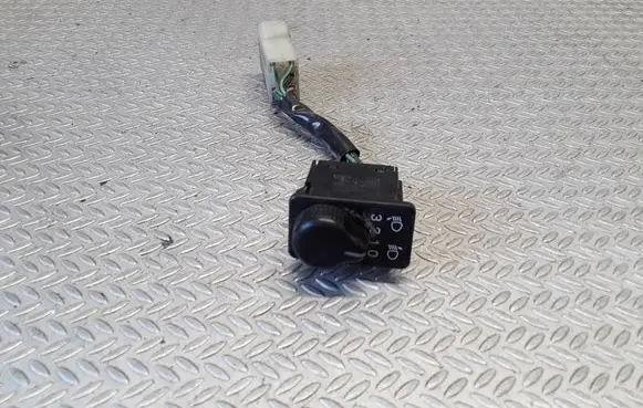 Subaru Impreza I Headlight level height control switch