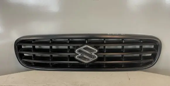 Suzuki Baleno EG Front bumper upper radiator grill