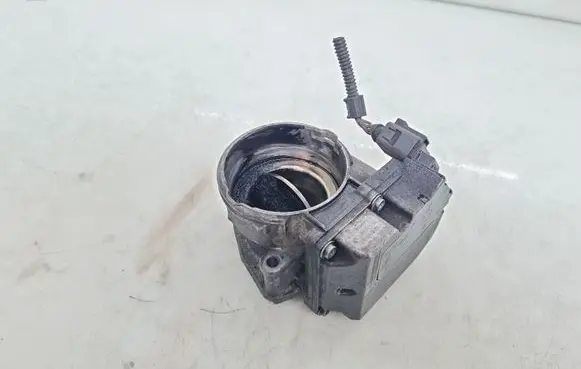 Volkswagen Touran I Throttle valve 03G128063C