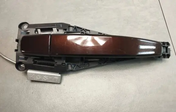 Rear door exterior handle/bracket
