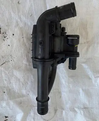 Thermostat/thermostat housing