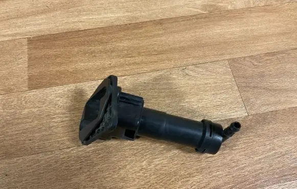 Nissan Primera Headlight washer spray nozzle 28655AU300