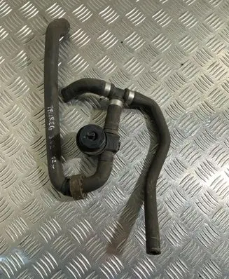 Volkswagen Touareg II Engine coolant pipe/hose 7P0122049H 1J0819809