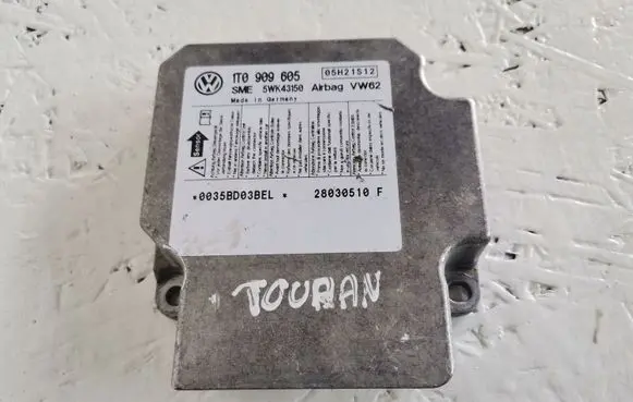 Volkswagen Touran I Airbag control unit/module 1T0909605