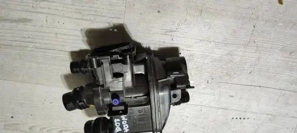 Thermostat/thermostat housing
