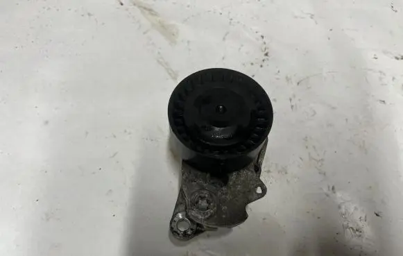 Seat Leon (5F) Generator/alternator belt tensioner 04E145299L