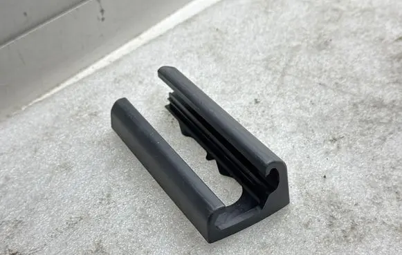 Tesla Model 3 Front driver seat rail trim 164155600B