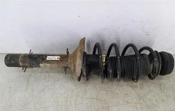 Volkswagen Golf IV Front shock absorber with coil spring 1J0413031S