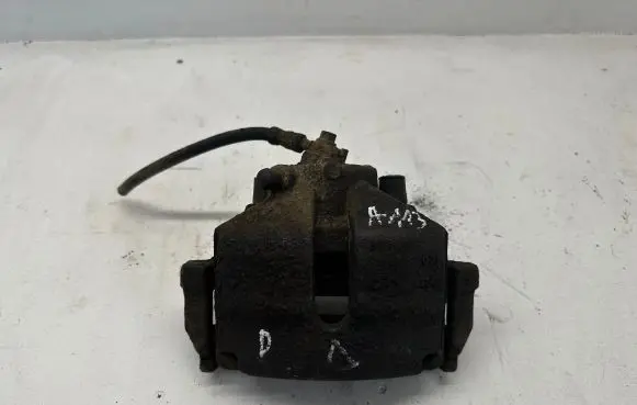 Volkswagen PASSAT B7 Front brake caliper