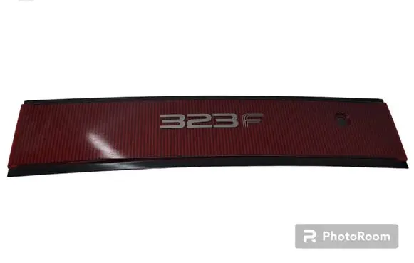 Mazda 323 F Trunk door license plate light bar 0674434