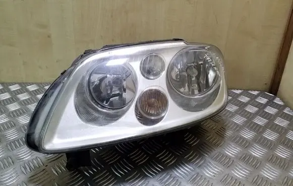 Volkswagen Touran I Headlight/headlamp 0301205601 1T0941005E