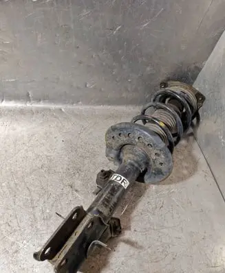 Nissan Juke I F15 Front shock absorber with coil spring 54302