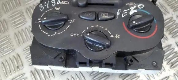 Peugeot 206 Climate control unit 1068701 64138