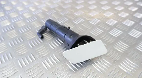 Volkswagen Touareg II Headlight washer spray nozzle 7P6955978