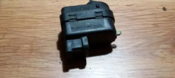 Renault Megane I Headlight level adjustment motor 7700840141