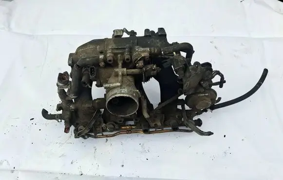 Nissan Primera Intake manifold UK73CH
