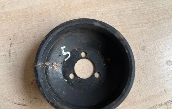 Opel Astra H Water pump pulley 24405900