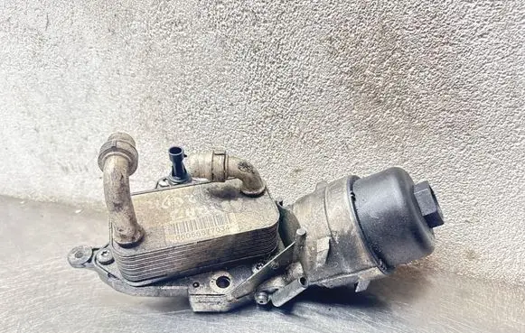 Opel Astra J Oil filter mounting bracket 55577034