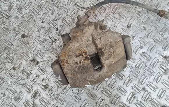Volkswagen Golf V Front brake caliper