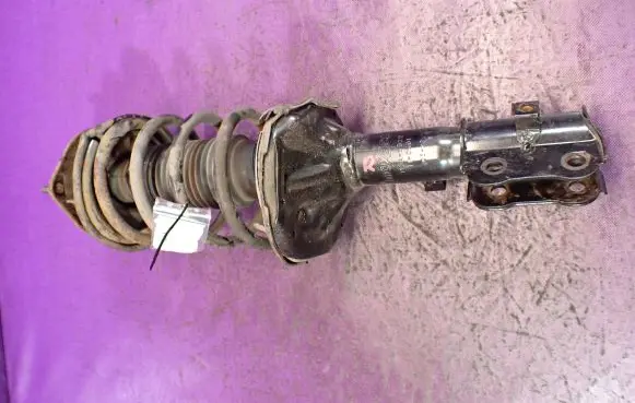 Hyundai Accent Front shock absorber with coil spring MGA5922