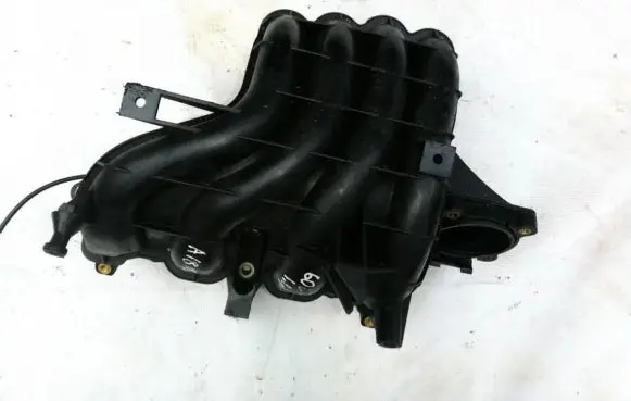 Volkswagen Golf IV Intake manifold 036129711