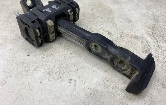Volvo V70 Rear door check strap stopper 