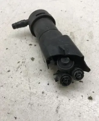 Chrysler Grand Voyager IV Headlight washer spray nozzle