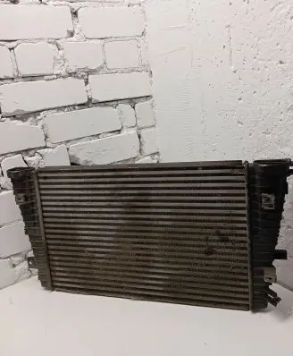 Opel Zafira B Intercooler radiator 13223395 WTP8784 0586A