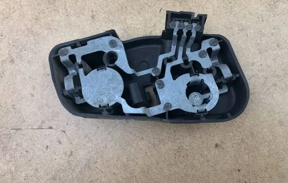 Tail light bulb cover holder