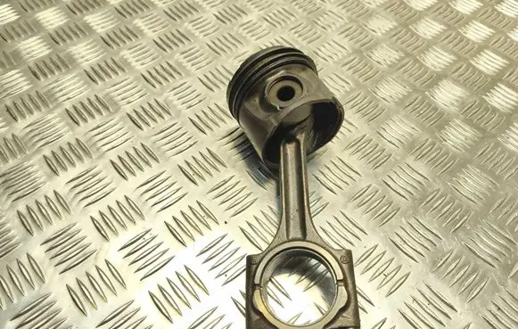 Piston with connecting rod
