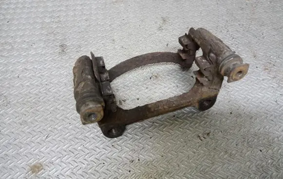 Volkswagen Transporter - Caravelle T5 Brake caliper pad carrier rear 