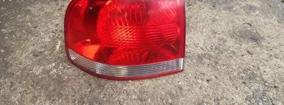 Volkswagen Touareg I Rear/tail lights 28259002 7L6945095K