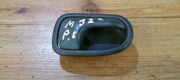 Mazda 323 Front door interior handle