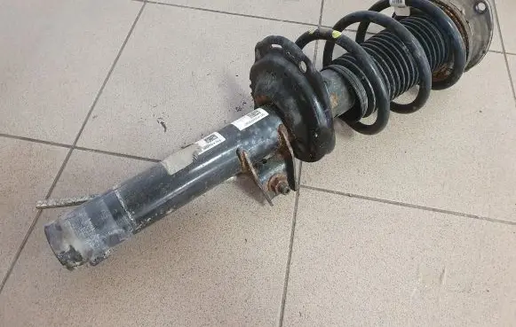 Volkswagen Tiguan Front shock absorber with coil spring 5QF412021QH