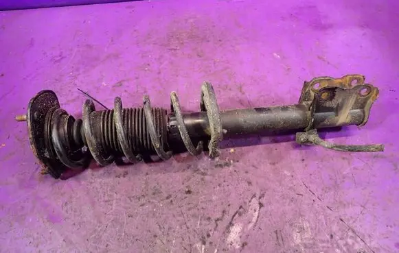 Mitsubishi Colt Front shock absorber with coil spring 