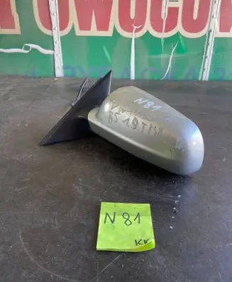 Volkswagen PASSAT B5 Front door electric wing mirror E1020479