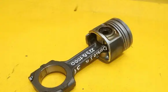 Piston with connecting rod