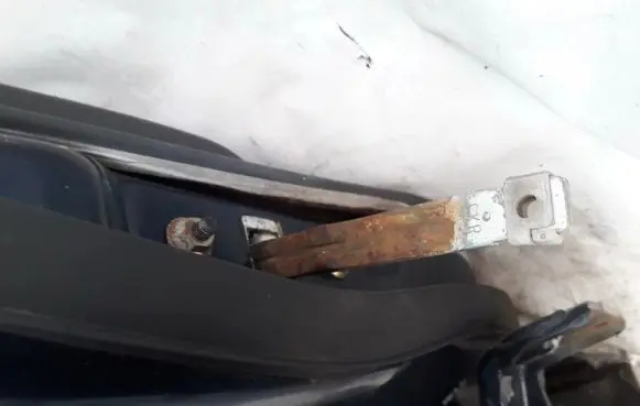 Mazda 626 Rear door check strap stopper