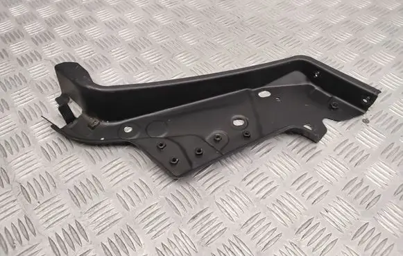 Nissan NV200 Headlight/headlamp mounting bracket F25123LMMA