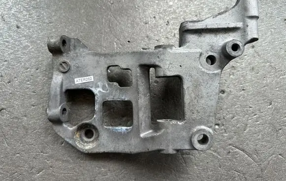 Nissan Terrano A/C compressor mount bracket 119105S900