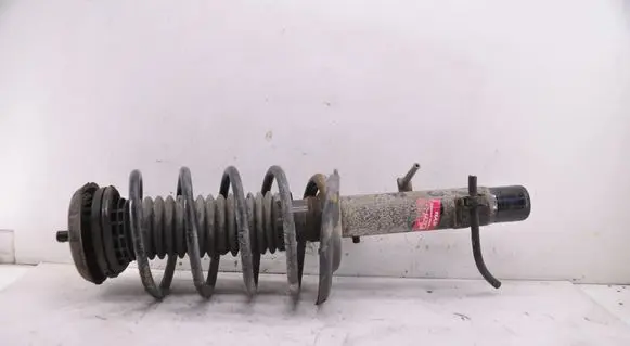 Peugeot 208 I Front shock absorber/damper 