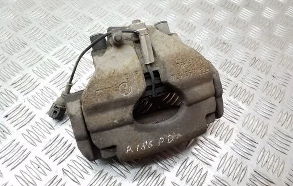 Volkswagen Touareg I Front brake caliper 7L6106D