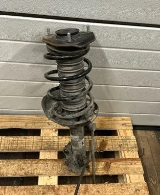 Toyota Corolla E210 E21 Front shock absorber with coil spring 4852002M60