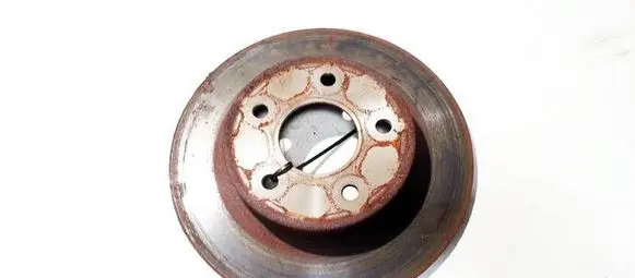 Nissan Almera Tino Rear brake disc neventiliuojamas